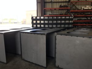 A group of concrete blocks in a warehouse.