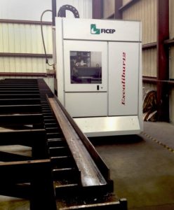 A machine that is in the middle of some metal.